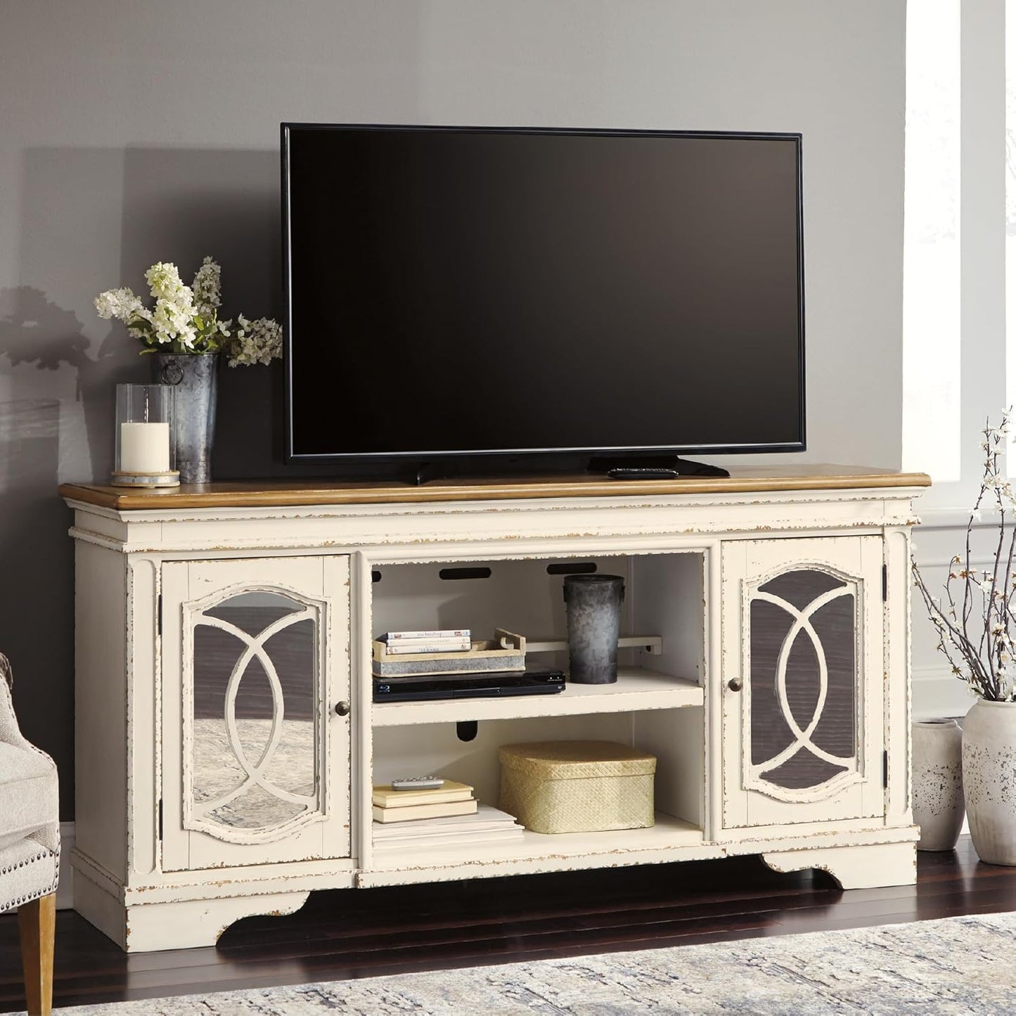 Signature Design by Ashley Realyn Farmhouse TV Stand with Fireplace Option Fits TVs up to 72", 2 Cabinet Doors and Adjustable Storage Shelf, White & Rustic Brown